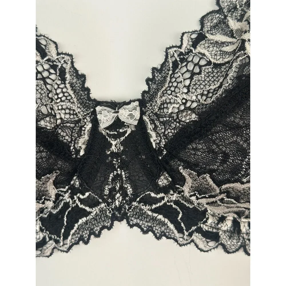 Lacy bra, by Paramour, black/white, size 36C.